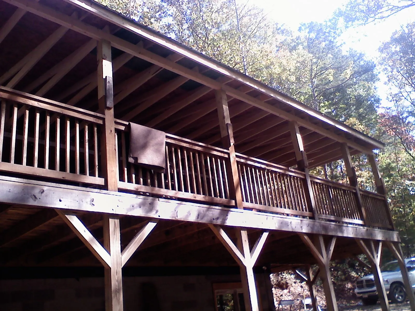 Timber framing under a new elevated porch and deck — Roof Leak Repair in Lolo by Roofing Brothers